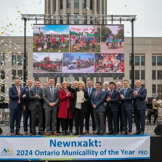 Newmarket town hall with flags, celebrating its second consecutive Municipality of the Year award for events